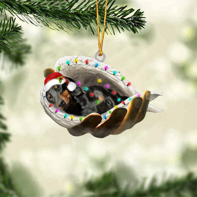 dachshund(Black and tan)Sleeping Angel In God Hand Christmas Ornament